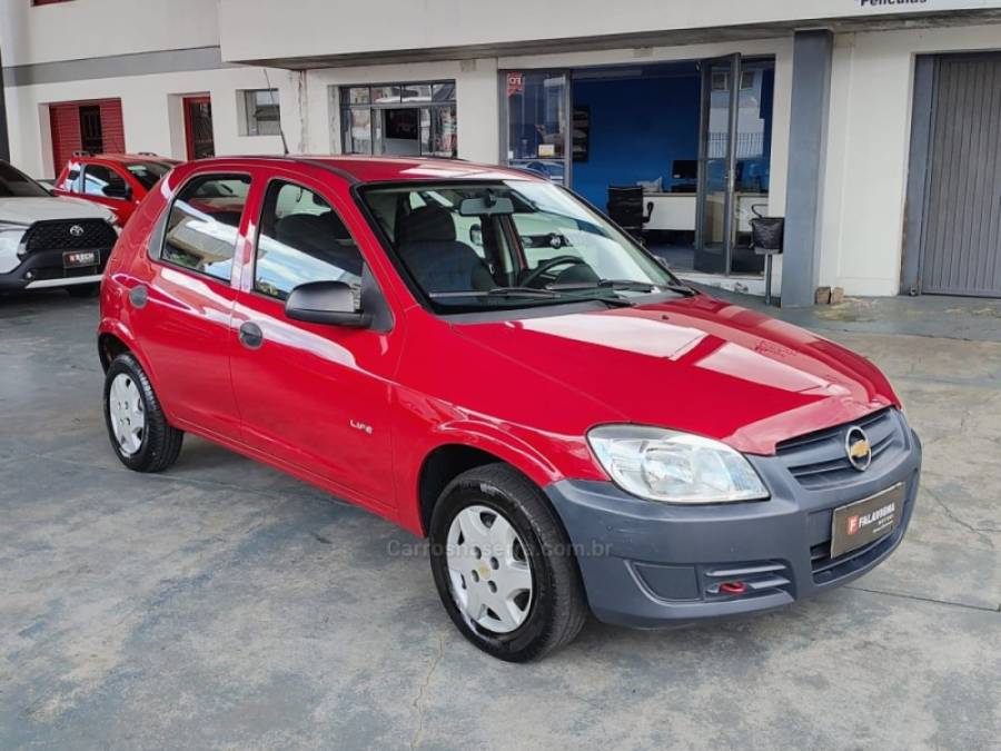 CHEVROLET - CELTA - 2009/2010 - Vermelha - R$ 21.900,00